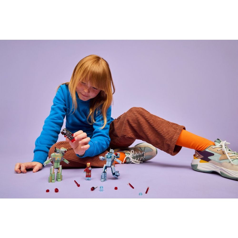 LEGO® Super Heroes - Iron Man si War Machine vs dronele Hammer